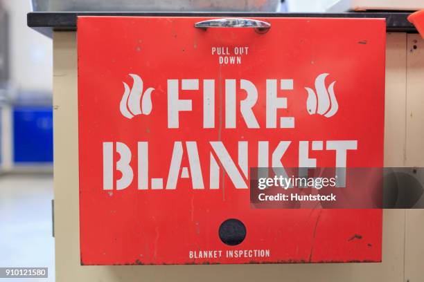 fire blanket in chemistry lab - löschdecke stock-fotos und bilder
