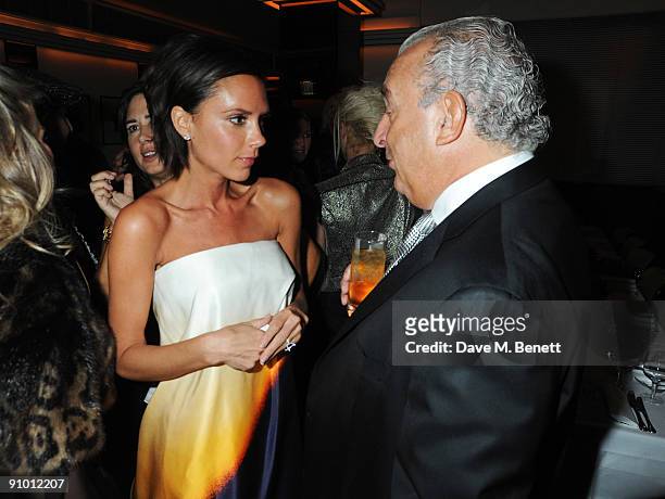 Victoria Beckham and Sir Philip Green attend the private dinner hosted by editor of British Vogue, Alexandra Shulman in association with...