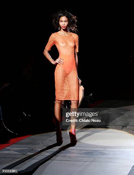 Model walks down the runway during the House of Holland show at LFW Spring Summer 2010 fashion show at The Guildhall on September 21, 2009 in London,...