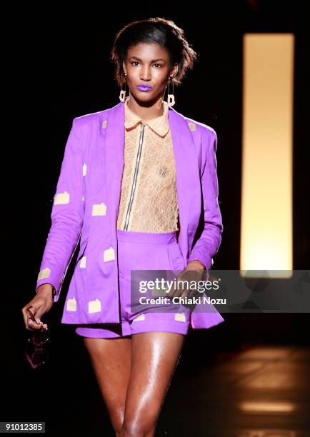 Model walks down the runway during the House of Holland show at LFW Spring Summer 2010 fashion show at The Guildhall on September 21, 2009 in London,...