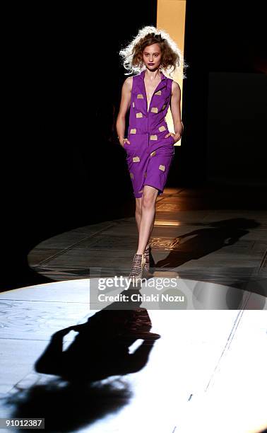 Model walks down the runway during the House of Holland show at LFW Spring Summer 2010 fashion show at The Guildhall on September 21, 2009 in London,...