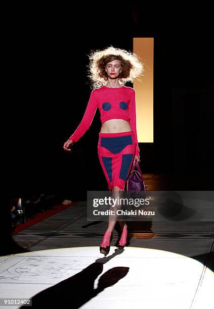 Model walks down the runway during the House of Holland show at LFW Spring Summer 2010 fashion show at The Guildhall on September 21, 2009 in London,...