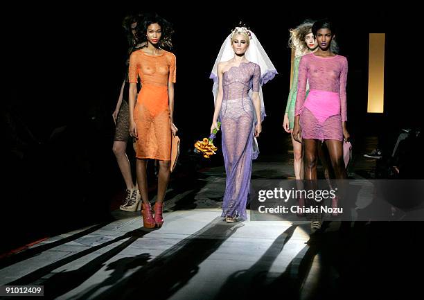 Model walks down the runway during the House of Holland show at LFW Spring Summer 2010 fashion show at The Guildhall on September 21, 2009 in London,...