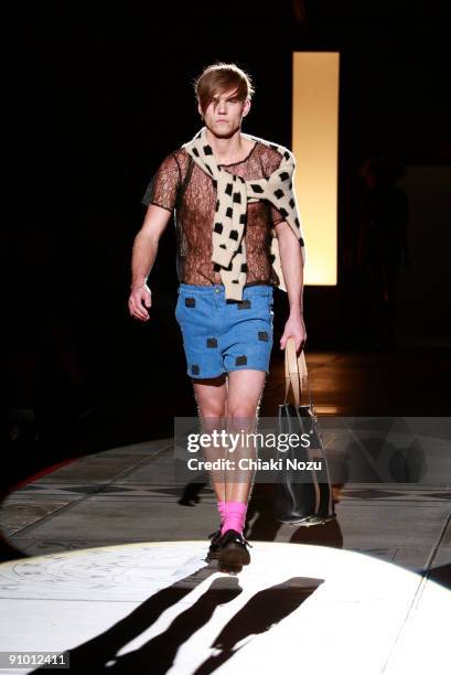 Model walks down the runway during the House of Holland show at LFW Spring Summer 2010 fashion show at The Guildhall on September 21, 2009 in London,...