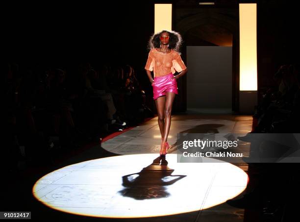 Model walks down the runway during the House of Holland show at LFW Spring Summer 2010 fashion show at The Guildhall on September 21, 2009 in London,...