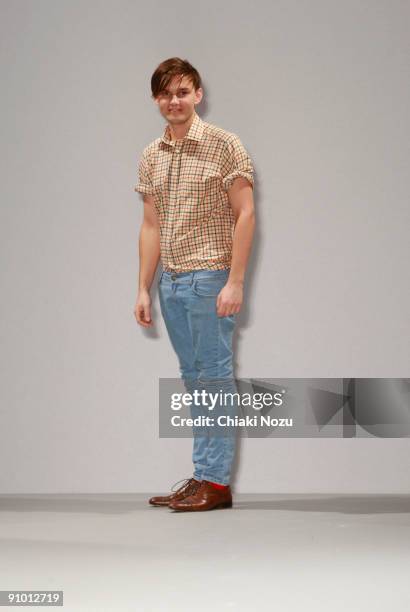 Designer William Tempest walks down the runway during the William Tempest show at LFW Spring Summer 2010 fashion show at the Freemason's Hall at on...