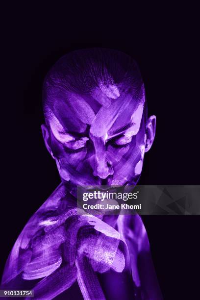 ultra violet portrait - female body painting stock-fotos und bilder