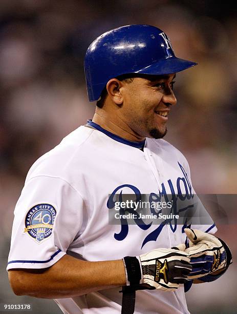 Miguel Olivo of the Kansas City Royals smiles during the game against Boston Red Sox on September 21, 2009 at Kauffman Stadium in Kansas City,...