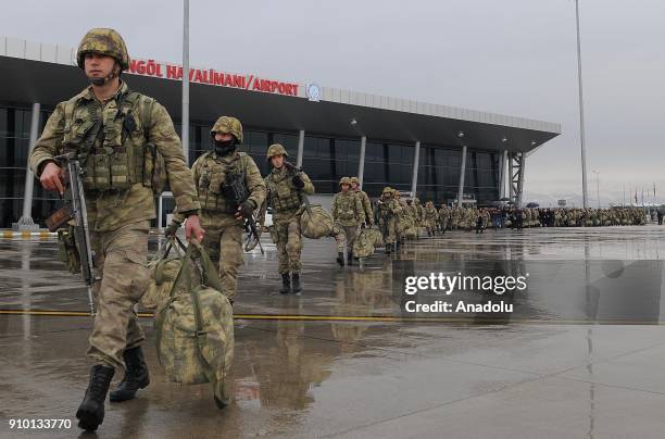 Commandos, dispatched to Afrin to take part in 'Operation Olive Branch', walk to get on a Turkish Air Force plane at Bingol Airport in Bingol, Turkey...