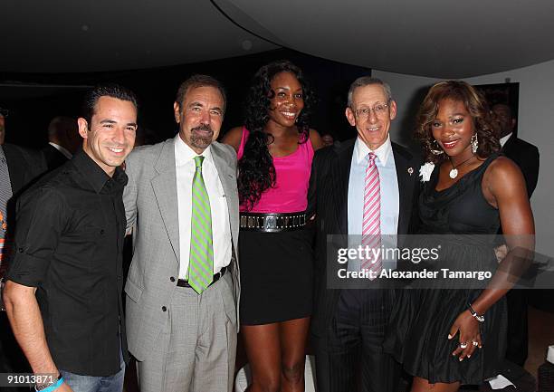 Helio Castroneves, Jorge Perez, Venus Williams, Stephen Ross and Serena Williams pose at the Ocean Drive Club prior to the Miami Dolphins game at...