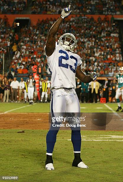 Defensive back Tim Jennings of the Indianapolis Colts points skyward after makiing a big play against the Miami Dolphins at Land Shark Stadium on...