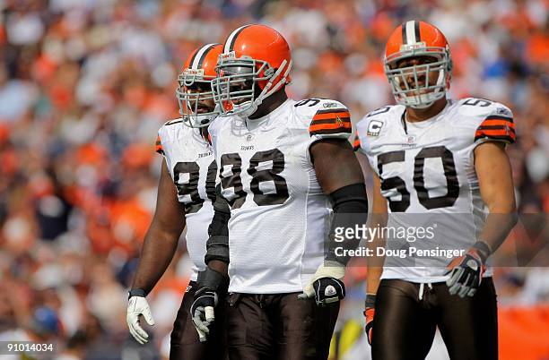 Defensive players Kenyon Coleman, Robarie Smith and Eric Barton of the Cleveland Browns take the field against the Denver Broncos during NFL action...