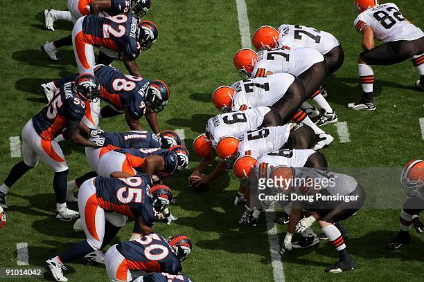 The Cleveland Browns offensive line takes the line of scrimmage against the Denver Broncos for a field goal attempt during NFL action at Invesco...