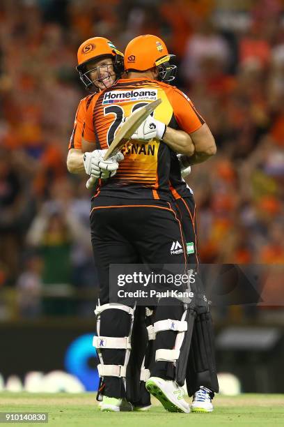 Adam Voges and Tim Bresnan of the Scorchers celebrate winning the Big Bash League match between the Perth Scorchers and the Adelaide Strikers at WACA...