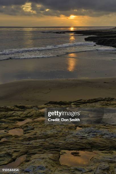 sunset sky and reflective pools - natural bridge state park stockfoto's en -beelden