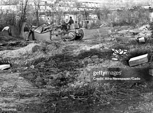 Bulldozers demolish Laurel Hill Cemetery, a historically African-American cemetery in Baltimore, Maryland, in preparation for the construction of the...