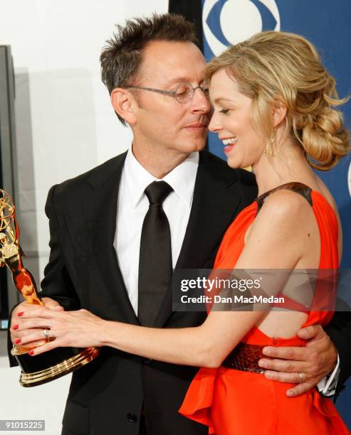 Michael Emerson with his award for Outstanding Supporting Actor in a Drama Series for "Lost" and Carrie Preston in the press room at the 61st...