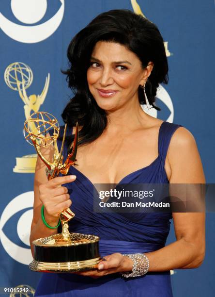 Shohreh Aghdashloo poses with her award for Outstanding Supporting Actress in a Miniseries or a Movie for "House of Saddam" in the press room at the...