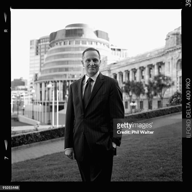 New Zealand Prime Minister John Key poses outside Parliament Buildings and the Beehive on September 19, 2009 in Wellington, New Zealand. John Key...