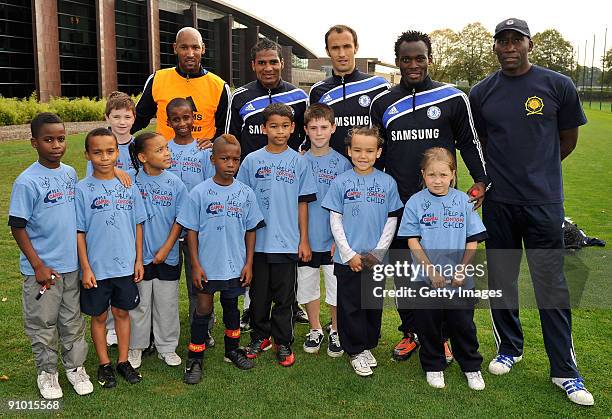 Johnny Vaughan and Lisa Snowdon of Capital Radio pose with Florent Malouda, Ricardo Carvalho and Michael Essien of Chelsea during the launch of...