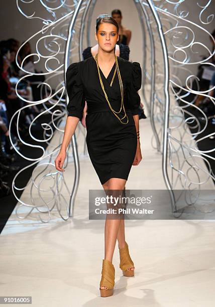 Model showcases a design by Kirrily Johnston as part of the Diet Coca-Cola Little Black Dress Show on day one of Air New Zealand Fashion Week 2009 at...