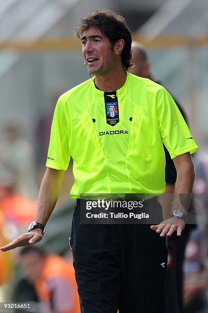 Second referee Mauro Bergonzi speeks during the Serie A match played between Parma FC and US Citta di Palermo at Stadio Ennio Tardini on September...