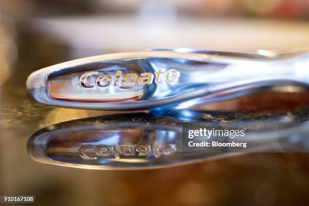 Colgate-Palmolive Co. Colgate brand toothbrush is arranged for a photograph in Tiskilwa, Illinois, U.S., on Wednesday, Jan. 24, 2018. The...