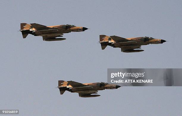 Iran's F-4 "Fantom" fighter jets fly during an annual military parade which marks Iran's eight-year war with Iraq, in the capital Tehran on September...