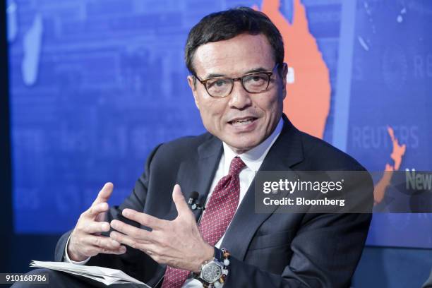 Takeshi Niinami, president and chief executive officer of Suntory Holdings Ltd., gestures as he speaks during a panel session on day three of the...