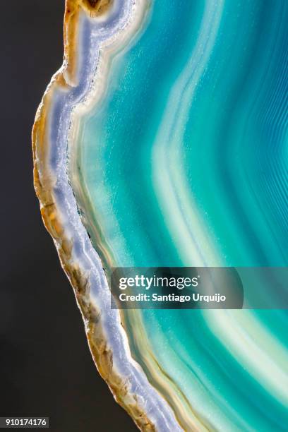 cross section of blue agate - edelstein stock-fotos und bilder