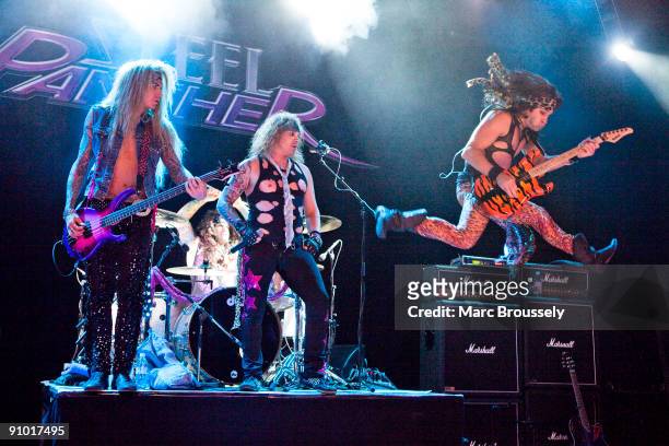 Lexxi Foxxx, Michael Starr, Stix Zadinia and Satchel of Steel Panther perform on stage at Shepherds Bush Empire on September 16, 2009 in London,...