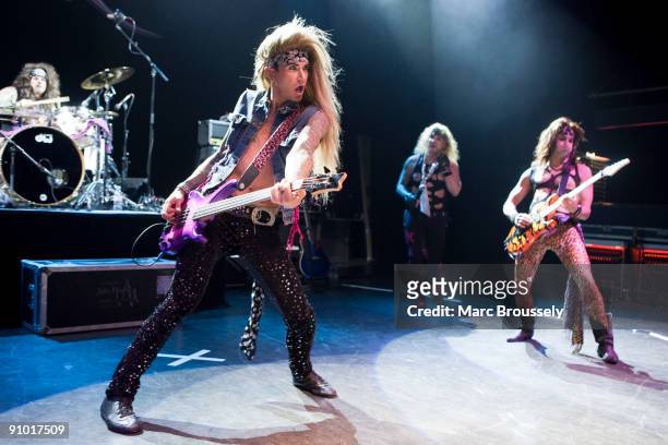Stix Zadinia, Lexxi Foxxx, Michael Starr and Satchel of Steel Panther perform on stage at Shepherds Bush Empire on September 16, 2009 in London,...