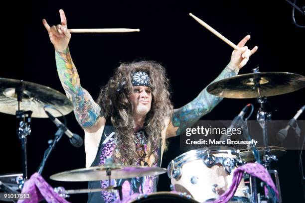 Stix Zadinia of Steel Panther perform on stage at Shepherds Bush Empire on September 16, 2009 in London, England.