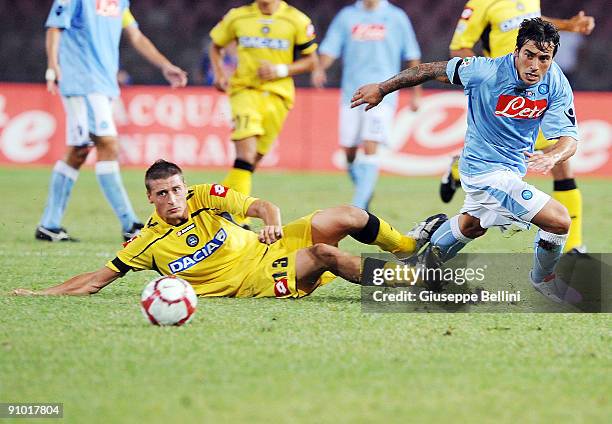 Andrea Coda Udinese Calcio and Ezequiel Lavezzi SSC Napoli during the Serie A match between SSC Napoli v Udinese Calcio at Stadio San Paolo on...