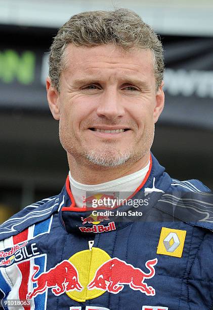 Formula One driver David Coulthard attends "Red Bull Racing Showrun" promotional event at Aeon Lake Town shopping center on September 22, 2009 in...