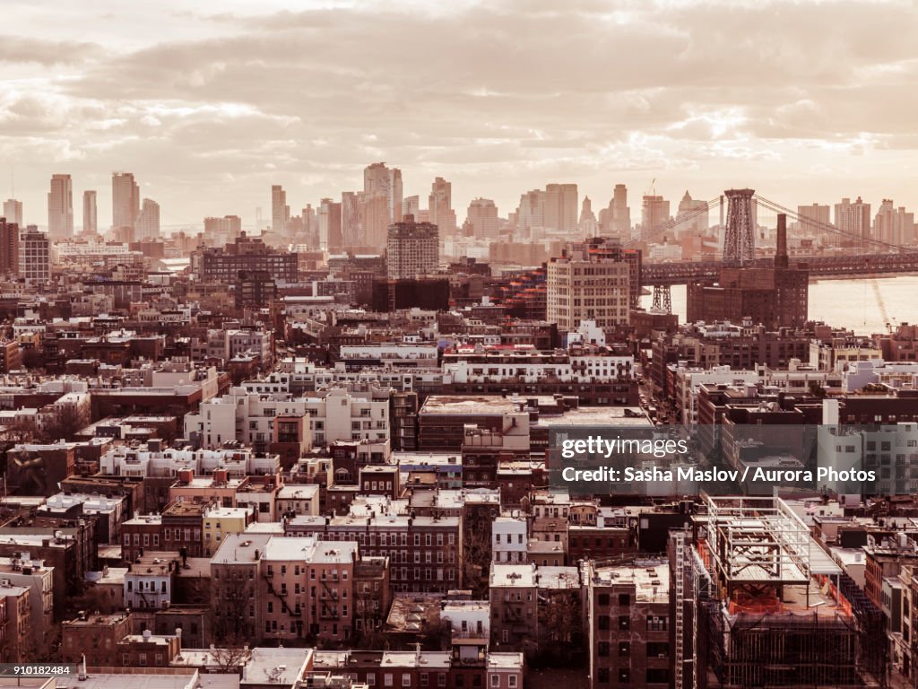 Residential district in Queens against skyline of New York, USA