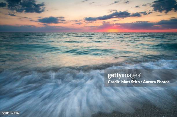 long exposure of gulf of mexico coast at scenic sunset, florida, usa - captiva island florida stock pictures, royalty-free photos & images