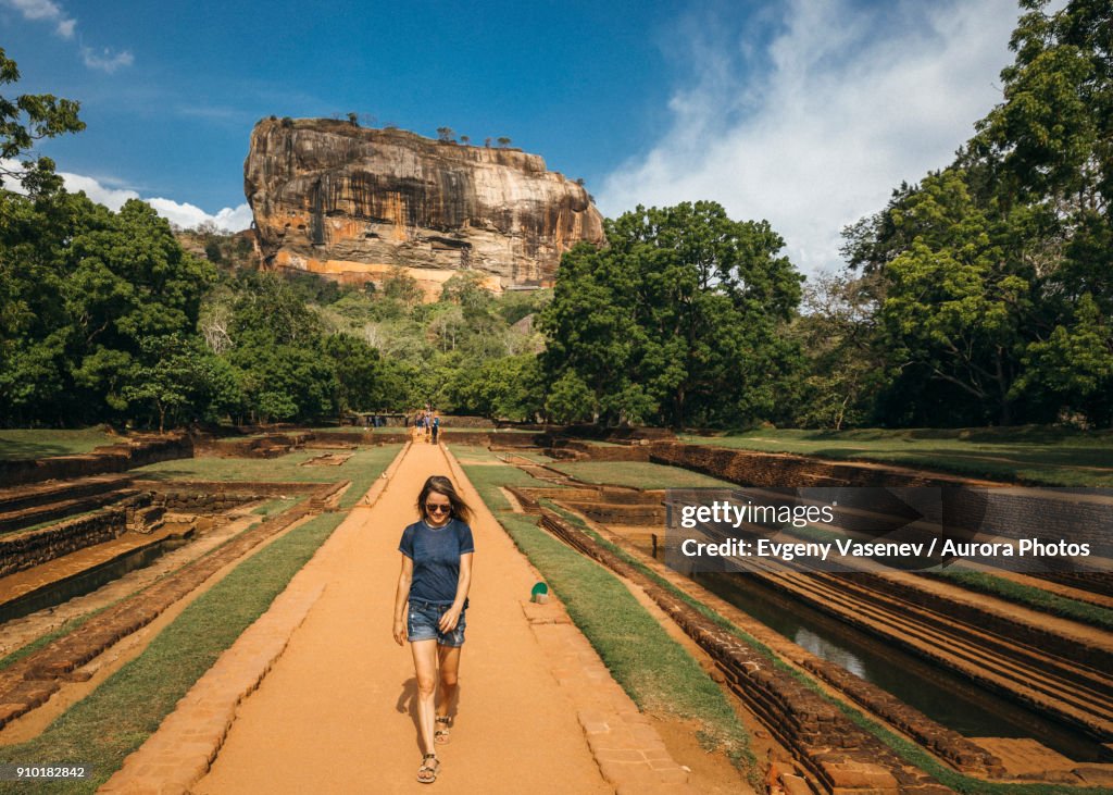 Woman against Sigiriya Lion Rock, Central Province, Sri Lanka