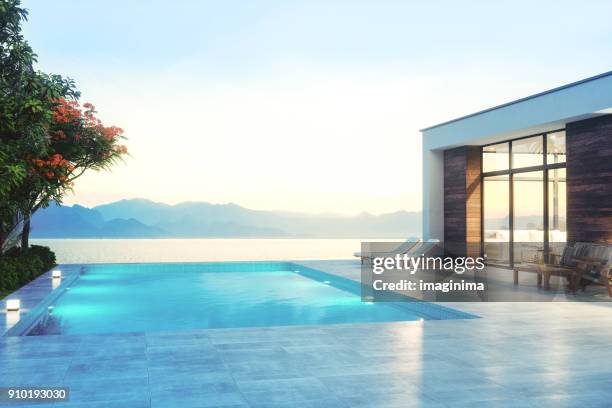 modern minimalist villa - model home exterior stock pictures, royalty-free photos & images