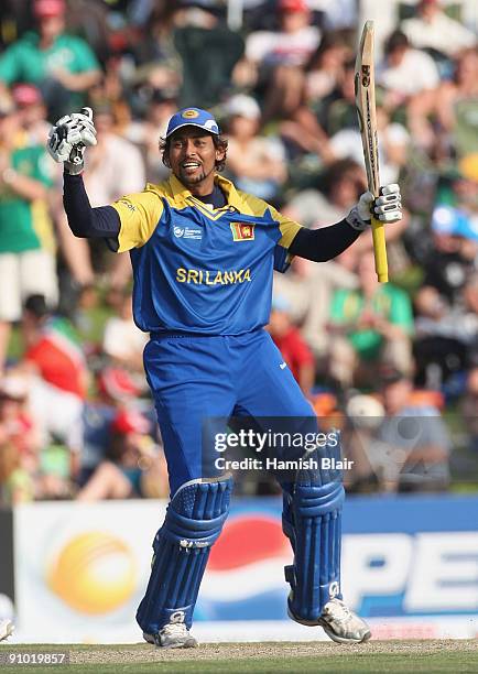 Tillakaratne Dilshan of Sri Lanka celebrates his century during the ICC Champions Trophy Group B match between South Africa and Sri Lanka played at...