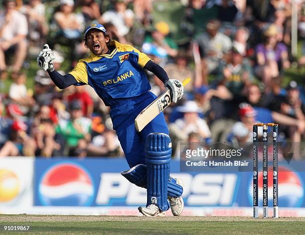 Tillakaratne Dilshan of Sri Lanka celebrates his century during the ICC Champions Trophy Group B match between South Africa and Sri Lanka played at...
