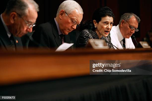 Senate Finance Committee member Sen. Olympia Snowe makes remarks during a mark up session on the health care reform legislation with Sen. Charles...