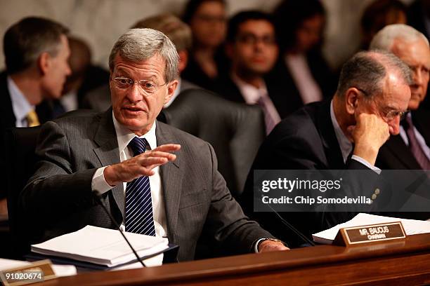 Senate Finance Committee Chairman Max Baucus presides over a mark up session on the health care reform legislation with ranking member Sen. Charles...