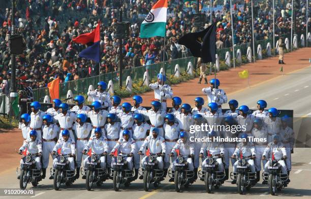 Indian soldiers display their skills on motorcycles during the full dress rehearsal for the Republic Day Parade-2008, in New Delhi.