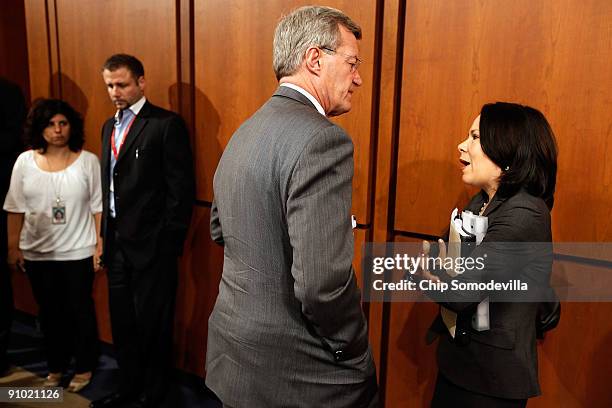 Senate Finance Committee Chairman Max Baucus talks with White House Office of Health Reform Director Nancy-Ann DeParle during a break in a mark up...