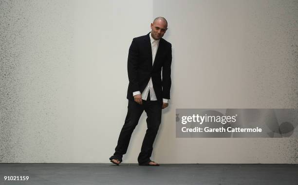 Designer Josh Goot walks the runway at the end of his fashion show during London Fashion Week Spring/Summer 2010 on September 21, 2009 in London,...