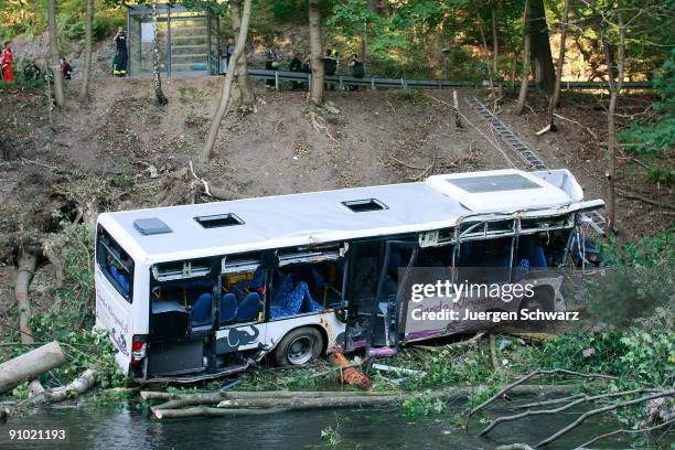 Rescue services work on the scene of a bus crash on September 22, 2009 in Dahlerau near Radevormwald, Germany. Five people were killed and seven were...