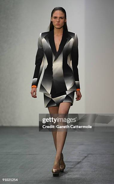 Model walks the runway during the Josh Goot fashion show during London Fashion Week Spring/Summer 2010 on September 21, 2009 in London, England.