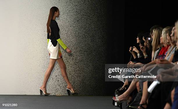 Model walks the runway during the Josh Goot fashion show during London Fashion Week Spring/Summer 2010 on September 21, 2009 in London, England.