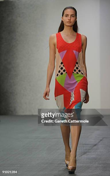 Model walks the runway during the Josh Goot fashion show during London Fashion Week Spring/Summer 2010 on September 21, 2009 in London, England.